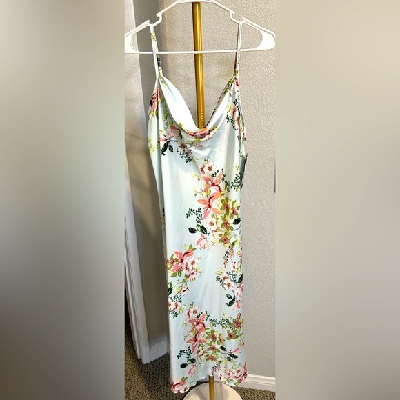 bebe Dresses & Skirts - Bebe slip dress. Size M. NWT! Has a very light blue tint to it. Midi dress.